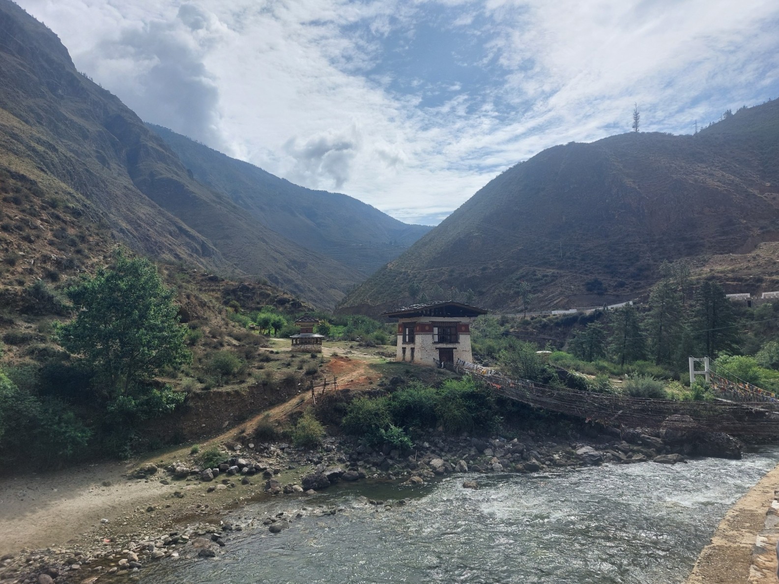 Bhutan landscape with mountains and traditional architecture